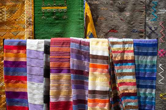 Traditional oriental scarves hanging in market