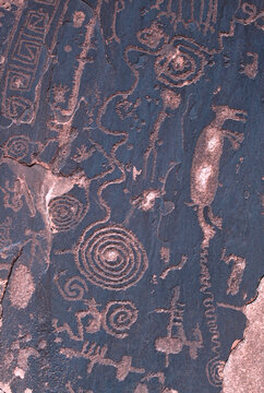Petroglyphs rock etchings on stone surface in Painted Desert Arizona