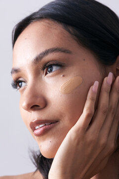 Latina Model with Luxurious Organic Foundation Swatch on Cheekbone