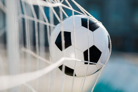 soccer ball in the net, selective focus