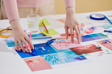 Concept artist with products and sketches are full of bright colors