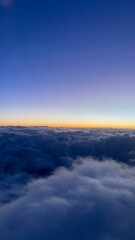 sunrise 
above the clouds
