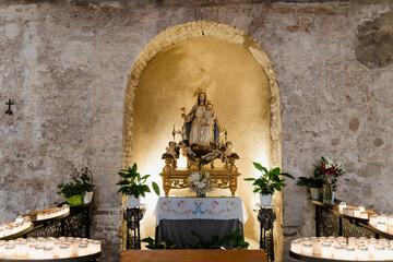 The statue of the Virgin Madonna inside a church