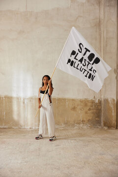 Female environmental activist with flag