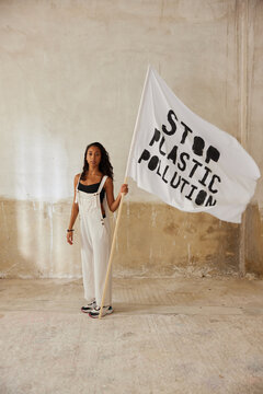 Female environmental activist with flag