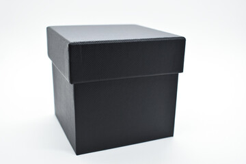 black paper box on white background, packaging industry