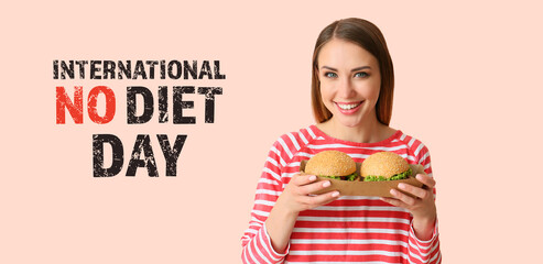Young woman with tasty burgers on pink background. International No Diet Day