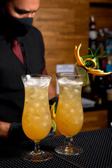 Bartender preparing cocktail at the cocktail bar. drinks concept
