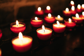Candles with flame in the church