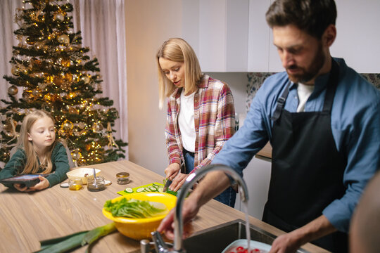 Child Preparation parent cook dinner Christmas Eve kitchen 