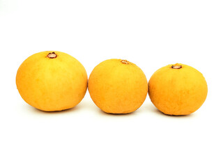 Ripe organic yellow santol Sweet and sour fruit that can be used to cook a variety of dishes both savory and sweet It is high in vitamin C which is beneficial to the body.  put on a white background.