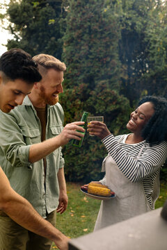 Man and Woman Toasting at Barbecue Party 