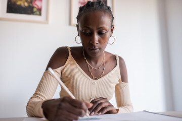 African American architect working from home