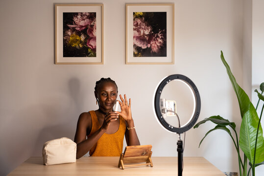 Black blogger advertising lip balm