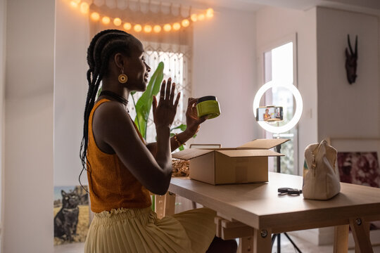 Black influencer advertising cosmetic product