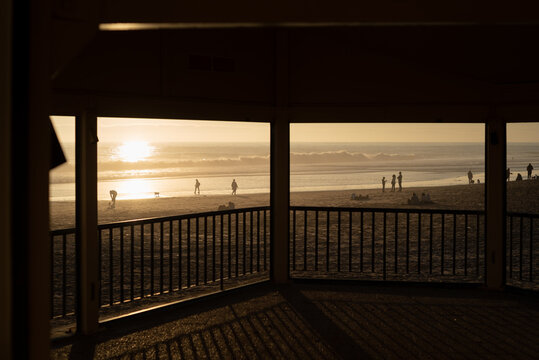 Winter ocean scene with silhouettes