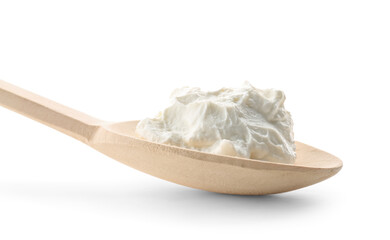 Wooden spoon with tasty cream cheese on white background, closeup
