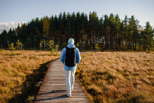 Man hiking among swamp