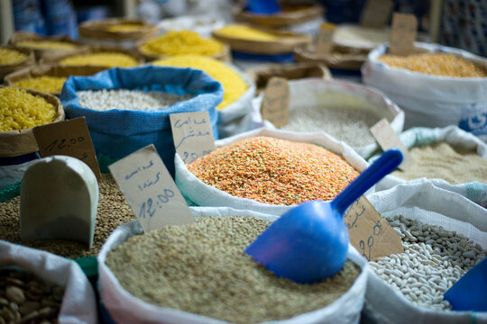 A detail of different grains for sale in the souk in Tangier, Morocco.