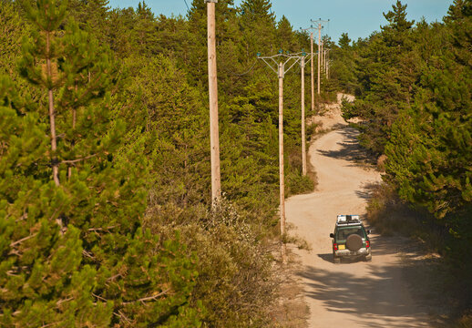 SUV driving on gravel road close to the Verdon gorge in south France