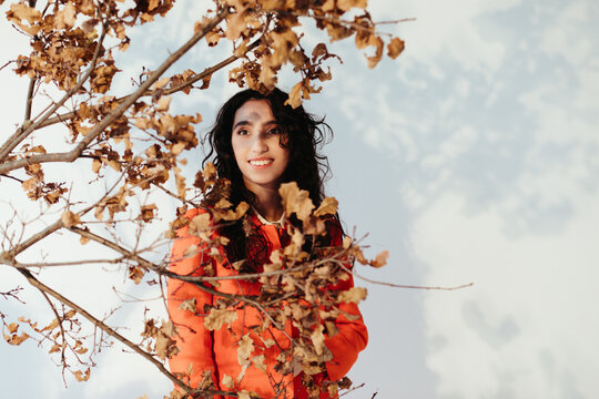 Happy woman autumn portrait in sunset 
