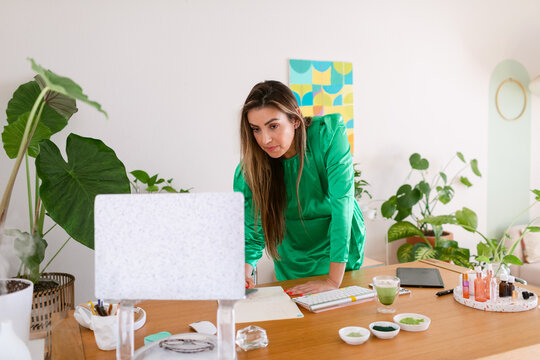 Natural cosmetics biologist working in her office.
