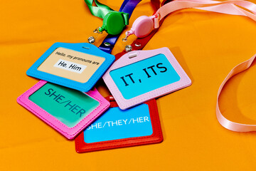 several tags with different gender pronouns