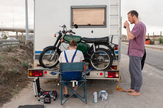 Two traveling friends in caravan.