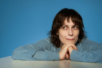 Dreamy young woman making wish