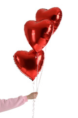 Woman with heart shaped balloons for Valentine's Day on white background