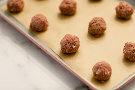 Closeups of Vegan Meatballs on a Baking Sheet