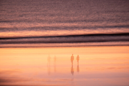 A beach at sunset. Moving picture