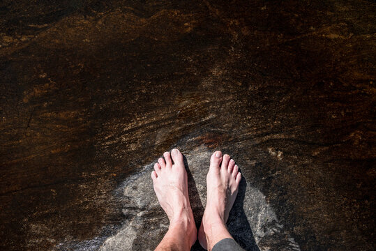 Bare feet on the shoreline