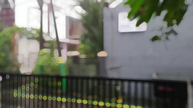 Defocus Blurred Footage Of Thunder Storm Hard Rain Seen From Inside House Terrace 