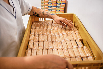 Operator taking inventory of finished product