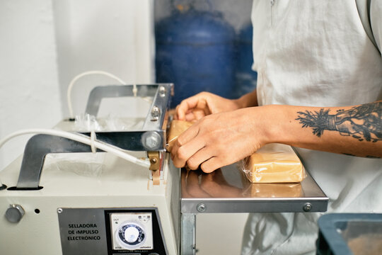 Man using a heat sealer
