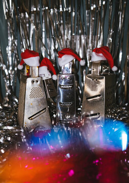 New Year's card with three kitchen graters.