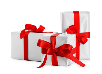 Gift boxes with beautiful bows isolated on white background. Valentine's Day celebration