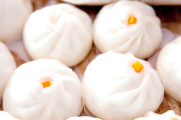 Steamed buns are steamed hot. There are many types of buns. (Pork custard pork) is popular for Chinese people of Chinese descent.