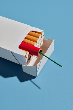 Box with cigarettes and firecracker