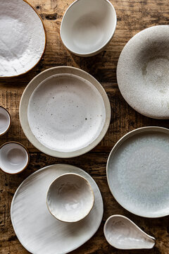 Mix of white ceramic plates and bowls
