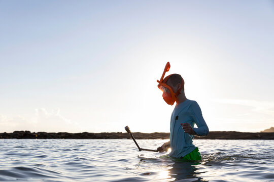 Boy Snorkeling underwater camera in Costa Rica making video