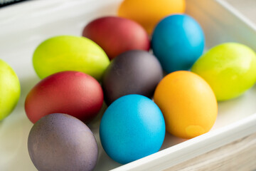 Painted eggs on the table after painting, a symbol of Easter, eggs 
