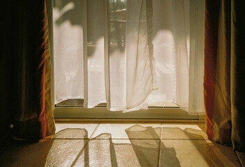 Net curtains and sunshine
