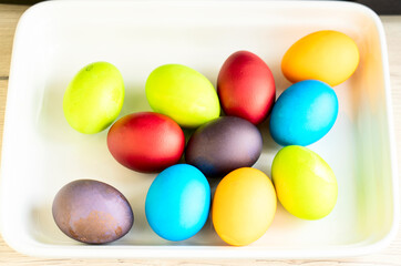 Painted eggs on the table after painting, a symbol of Easter, eggs 