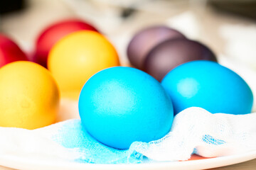 Painted eggs on the table after painting, a symbol of Easter, eggs 