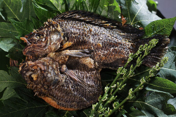 Crispy fried tilapia is perfect served with warm rice