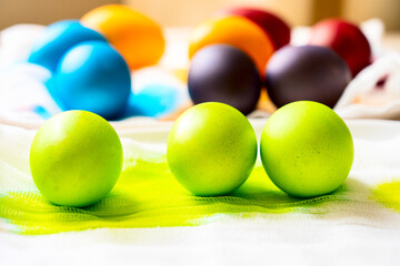 Painted eggs on the table after painting, a symbol of Easter, eggs 