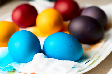 Fototapeta na wymiar Painted eggs on the table after painting, a symbol of Easter, eggs 
