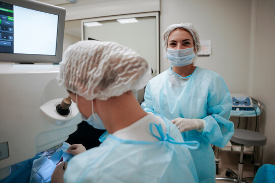 The surgeon performs an eye operation